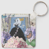 Blauwe elegante vrouw bloemrijke fancy jurk sleutelhanger (Achterkant)