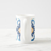 Blauwe en bruine melkkan porselein kop (Achterkant)