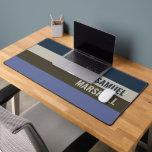 Blauwe en bruine strepen patroon bureaumat<br><div class="desc">Verbeter uw werkruimte met de Blue en Brown Stripes Pattern Desk Mat. Met een stijlvol en modern gestreept ontwerp voegt deze mat een verfijnde touch toe en biedt hij een glad oppervlak voor uw toetsenbord en muis. Ideaal voor thuiskantoren, gamesetups of creatieve werkruimtes, het is een geweldige keuze voor diegenen...</div>