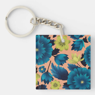Blauwe en gele bloemen op perzik achtergrond sleutelhanger