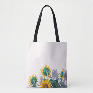 Blauwe en gele bloemen op witte wand tote bag