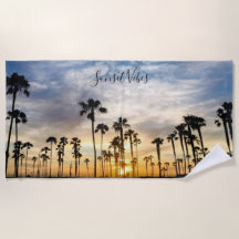 Blauwe en gele rode palmbomen - zonsondergang