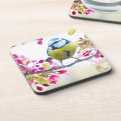  blauwe en gele vogel op een foto van de Tak Bier Onderzetter (Linkerzijde)