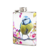 blauwe en gele vogel op een foto van de Tak Heupfles (Links)