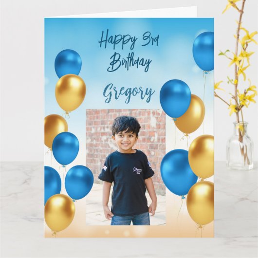 Blauwe en gouden ballonnen blauwe achtergrondfoto kaart (Gele Bloem)