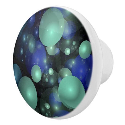 Blauwe en Groene Bubbels Over Zwart Keramische Knop (Rechts)