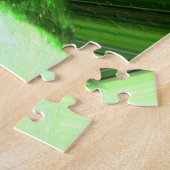 Blauwe en groene planetaire kunst legpuzzel (Zijkant)