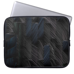 Blauwe en groene stickers op blauwe plastic verpak laptop sleeve