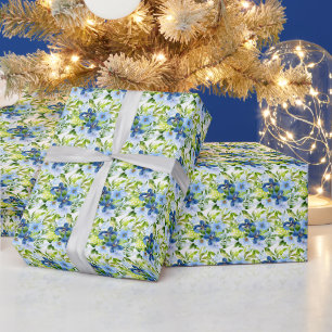Blauwe en marinebloemen met bladgroen cadeaupapier