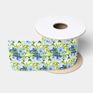 Blauwe en marinebloemen met bladgroen satijnen lint