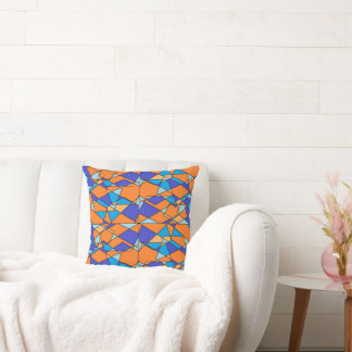 Blauwe en oranje kussen met geometrisch ontwerp