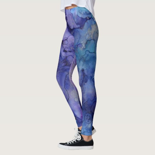 Blauwe en paarse leggings (Links)