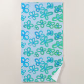 Blauwe en turquoise bloemen badhanddoek (Voorkant)