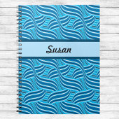 Blauwe en Turquoise Ribbony Swirls met naam Notitieboek