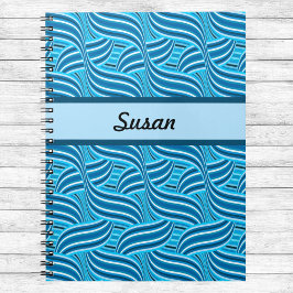 Blauwe en Turquoise Ribbony Swirls met naam Notitieboek