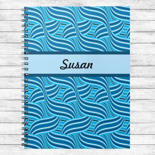 Blauwe en Turquoise Ribbony Swirls met naam Notitieboek