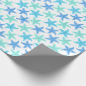 Blauwe en turquoise zeesterren cadeaupapier (Hoek)