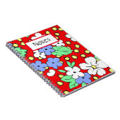 Blauwe en witte bloemen op rood spiraalvormig noti notitieboek (Rechterzijde)