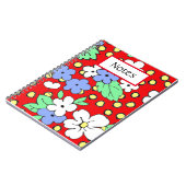 Blauwe en witte bloemen op rood spiraalvormig noti notitieboek (Linkerzijde)