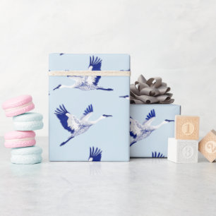 Blauwe en witte kranen cadeaupapier