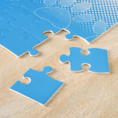 Blauwe En Witte Pootafdrukken Met Krantenpapier Ac Legpuzzel (Zijkant)