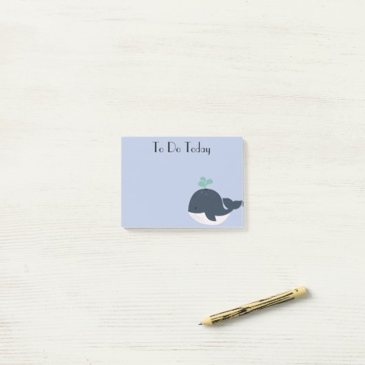 Blauwe en witte walvis post-it® notes (Op bureau)