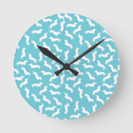 Blauwe en witte wandklok