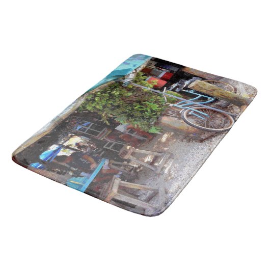 Blauwe fiets badmat (Gekanteld)