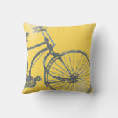 Blauwe fiets op gele piloot kussen (Achterkant)