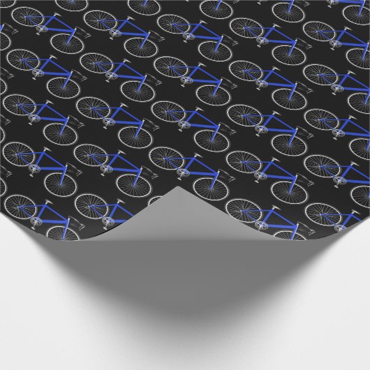 blauwe fiets op zwart verpakkingspapier cadeaupapier (Hoek)