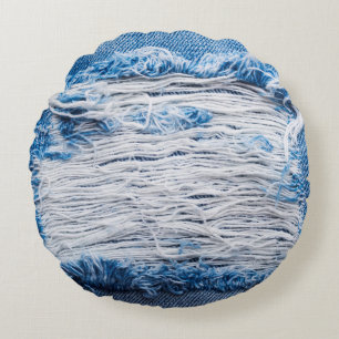Blauwe gedraaide denim jeans textuur met ruimte vo rond kussen