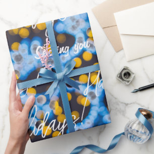 Blauwe gele kerstverlichting cadeaupapier