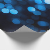Blauwe glitter bokeh textuurlichten cadeaupapier (Hoek)