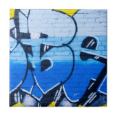 Blauwe graffiti op een muur tegeltje (Voorkant)