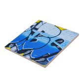Blauwe graffiti op een muur tegeltje (Zijkant)