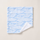 Blauwe handdoek set met illustratief golfpatroon (Wasdoekje)