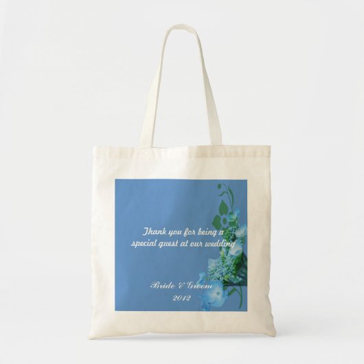 blauwe hydrangebloemen tegen blauwe achtergrond tote bag (Voorkant)