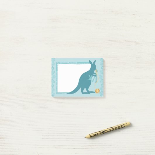 Blauwe kangoeroenbreipennen, bold van garen post-it® notes (Op bureau)