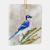 Blauwe kap in een dennenboom met sneeuw keramisch ornament (Rechts)