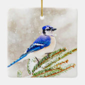 Blauwe kap in een dennenboom met sneeuw keramisch ornament (Achterkant)