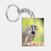 Blauwe kap met pinda's sleutelhanger (Voorkant Links)