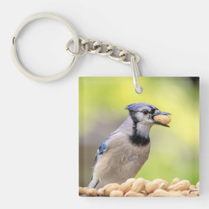 Blauwe kap met pinda's sleutelhanger