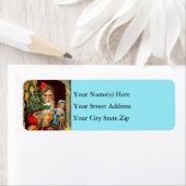  blauwe kerstman met speelgoed kerstboom etiket (Insitu)