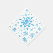 blauwe kerstsnowflakes op winterwit servet (Hoek)