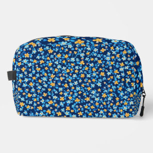 Blauwe kleine bloemen patroon toilettasje