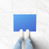 Blauwe kleurverloop deurmat