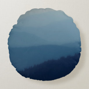 Blauwe lagen rond kussen