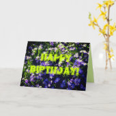 Blauwe lente bloemen op groene gelukkige verjaarda kaart (Gele Bloem)