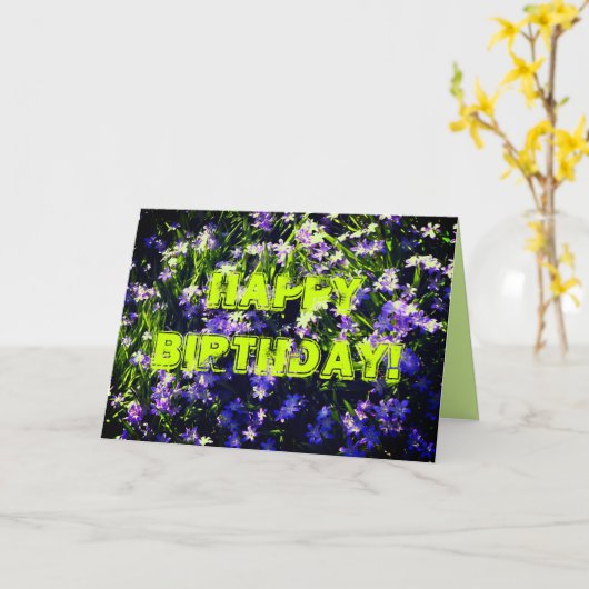 Blauwe lente bloemen op groene gelukkige verjaarda kaart (Gele Bloem)