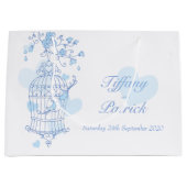 Blauwe liefdesvogels openen een cadeautas voor een (Voorkant)